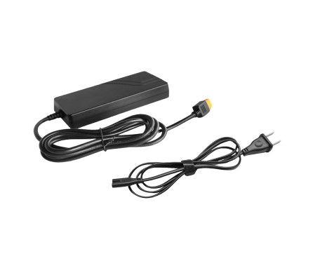 Adaptador y cable de CA (varía según la región)